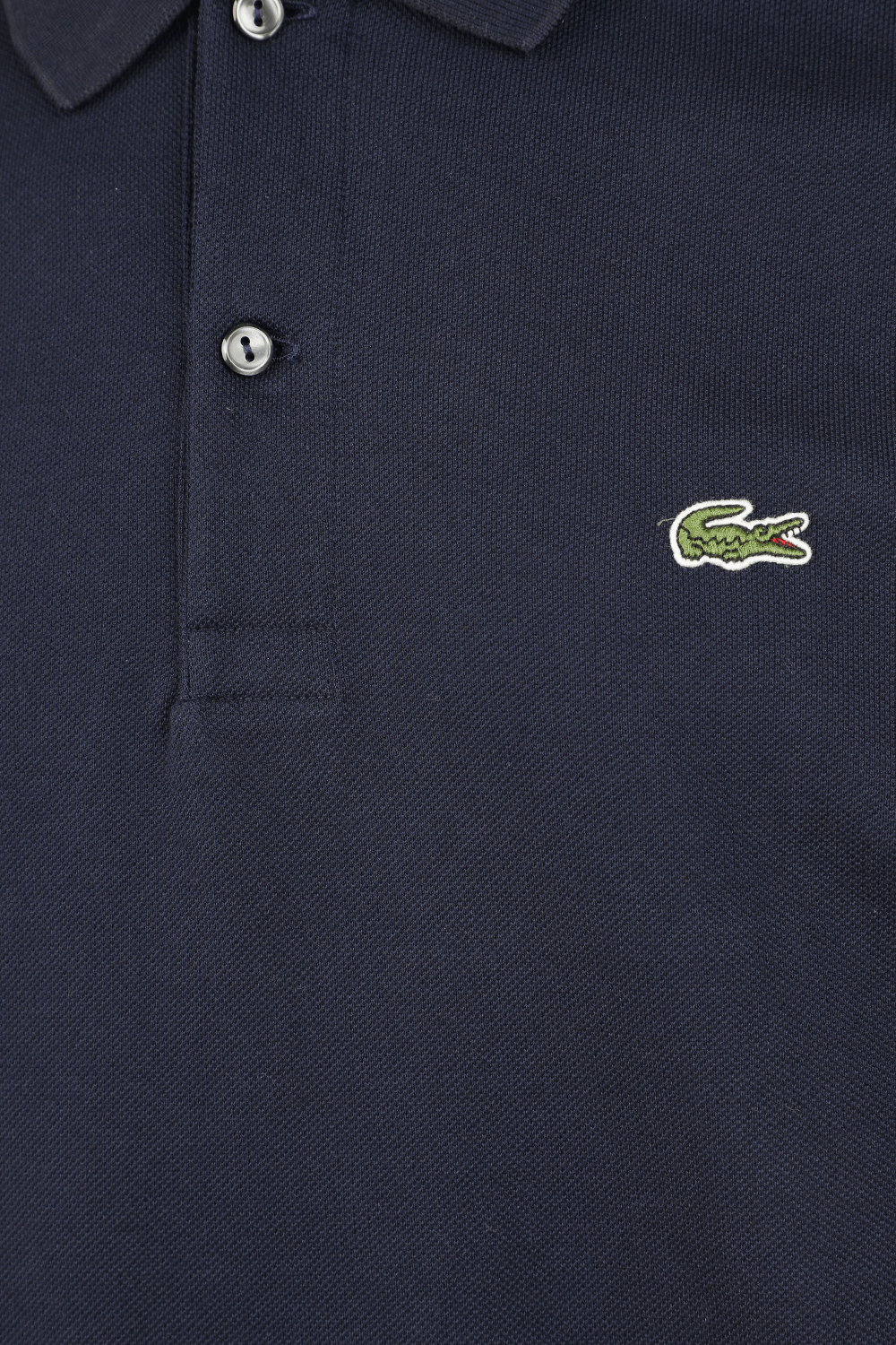 תמונה אחורית של חולצת פולו ארוכה בגוון כחול נייבי מכותנה