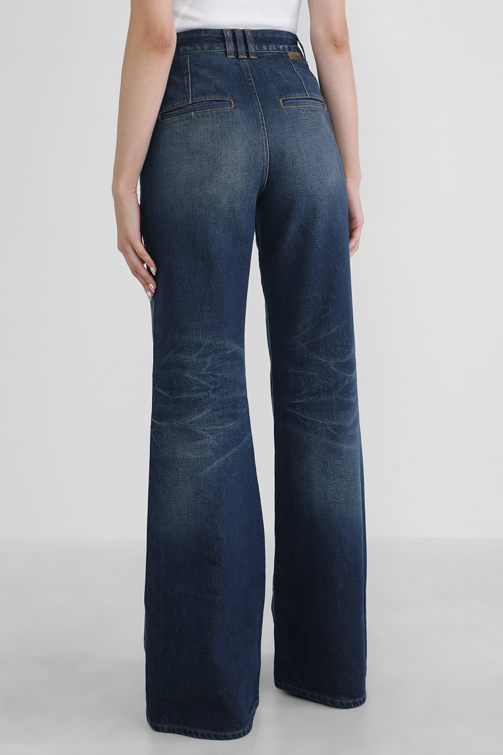 מכנסי ג`ינס עם כפתור סגירה מטאלי BALMAIN