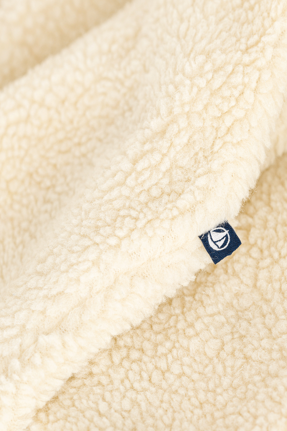 תמונת פנים של מעיל אוברול שרפה - גילאי ניובורן-18 חודשים