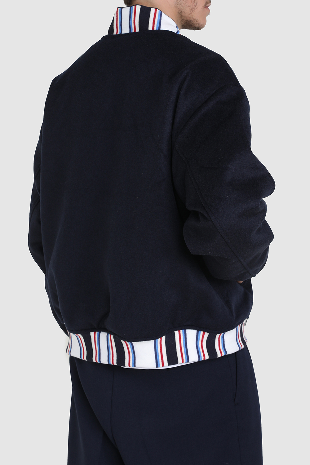 תמונת תקריב דוגמן של טומי X קלוט ז'קט בומבר