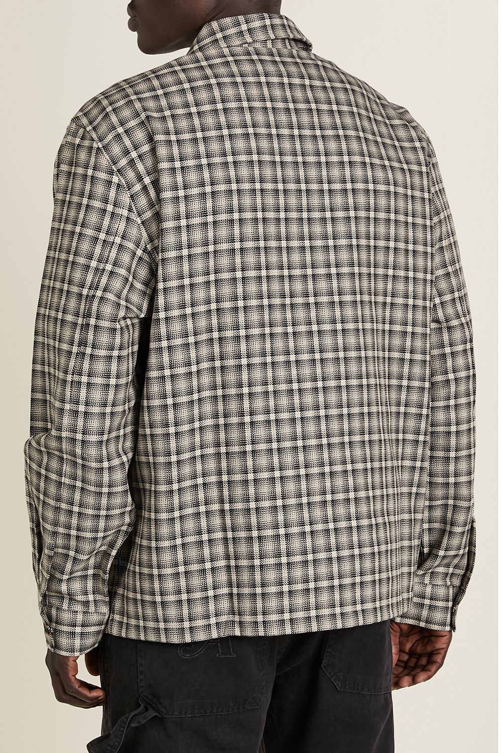 תמונת תקריב דוגמן של ז'קט משבצות